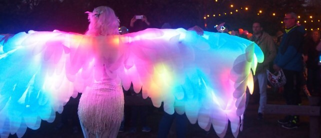 Performance art with an LED light fairy bringing magic to mid-winter
